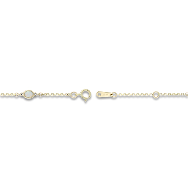 Main Image 2 of Oval-Cut Lab-Created Opal & Diamond Station Bracelet 1/20 ct tw 10K Yellow Gold 7.25"