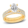 Thumbnail Image 0 of Lab-Created Diamond Bridal Set 3 ct tw Oval/Round 14K Yellow Gold