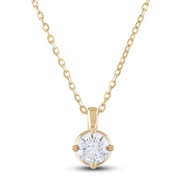 Image of diamond solitaire necklace with 14K yellow gold.