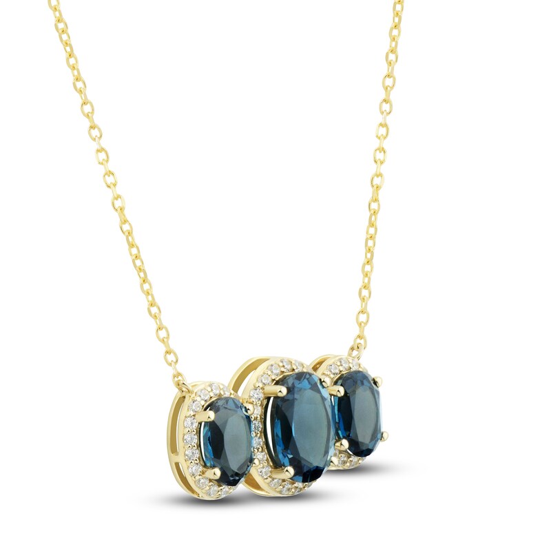 Main Image 2 of Natural Blue Topaz 3-Stone Necklace 1/4 ct tw Diamonds 10K Yellow Gold