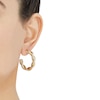 Thumbnail Image 1 of Twisted Tube Hoop Earrings 10K Yellow Gold