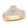 Thumbnail Image 1 of Diamond Halo Bridal Set 1-1/2 ct tw Oval/Round 14K Yellow Gold