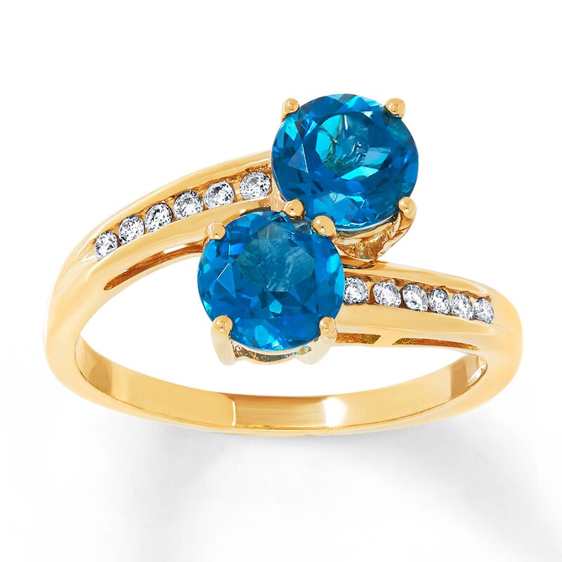 Blue Topaz Ring 1/8 ct tw Diamonds 10K Yellow Gold