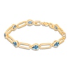 Thumbnail Image 0 of Kallati Pear-Shaped Natural Blue Topaz Bracelet 1/15 ct tw Diamonds 14K Yellow Gold 7"