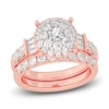 Thumbnail Image 1 of Diamond Halo Bridal Set 2 ct tw Round/Baguette 14K Rose Gold