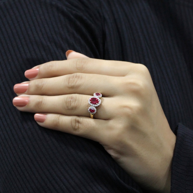 Main Image 3 of Oval-Cut Natural Ruby & Diamond Three-Stone Halo Ring 1/3 ct tw 10K Yellow Gold