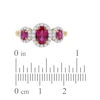 Thumbnail Image 4 of Oval-Cut Natural Ruby & Diamond Three-Stone Halo Ring 1/3 ct tw 10K Yellow Gold