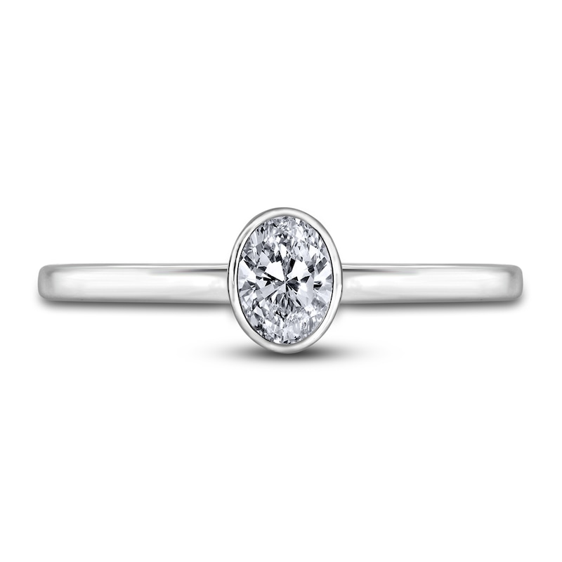 Main Image 3 of Diamond Solitaire Engagement Ring 1/2 ct tw Bezel-Set Oval 14K White Gold (I2/I)