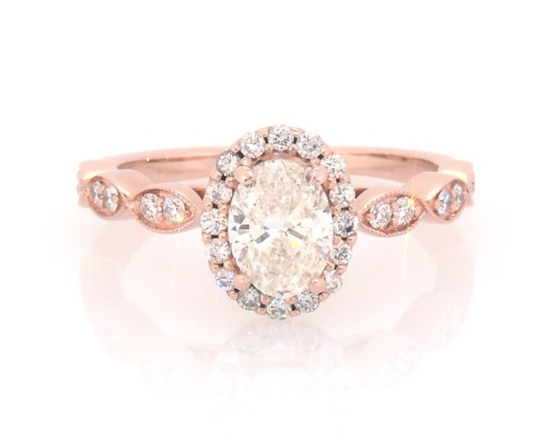 Main Image 1 of Previously Owned Oval-Cut Diamond Halo Engagement Ring 1 ct tw 14K Rose Gold Size 6.25