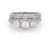 Thumbnail Image 1 of Previously Owned Round-Cut Diamond Three-Stone Halo Bridal Set 1-3/8 ct tw 14K White Gold Size 6