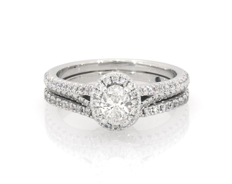Main Image 1 of Previously Owned Oval-Cut Diamond Halo Bridal Set 3/4 ct tw 14K White Gold Size 4.75