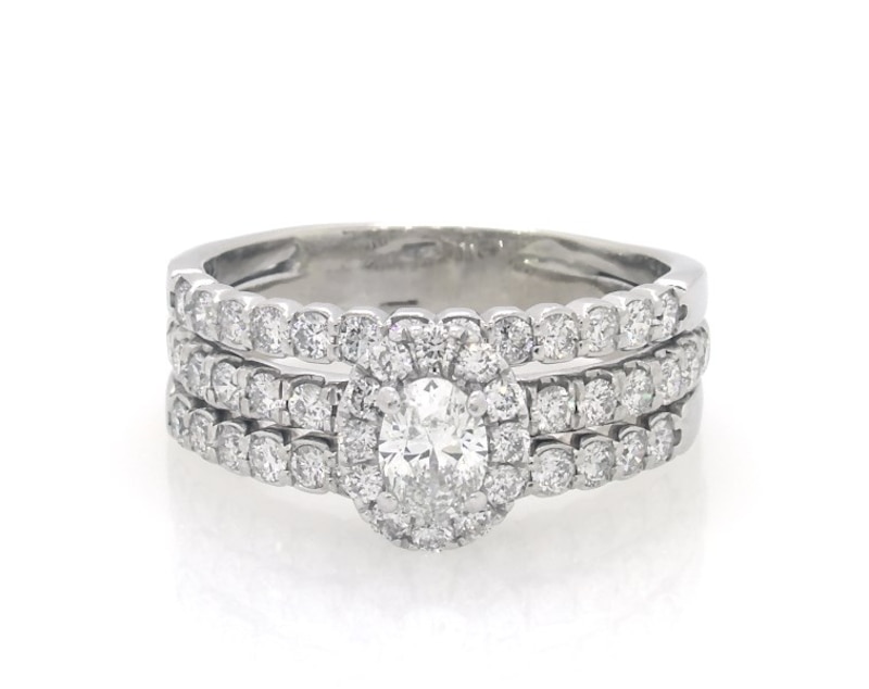 Main Image 1 of Previously Owned Oval-Cut Diamond Halo Bridal Set 1-1/4 ct tw 14K White Gold Size 6.25