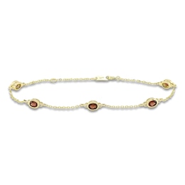 Oval-Cut Natural Garnet & Diamond Bezel-Set Bracelet 1/20 ct tw 10K Yellow Gold 7.25"