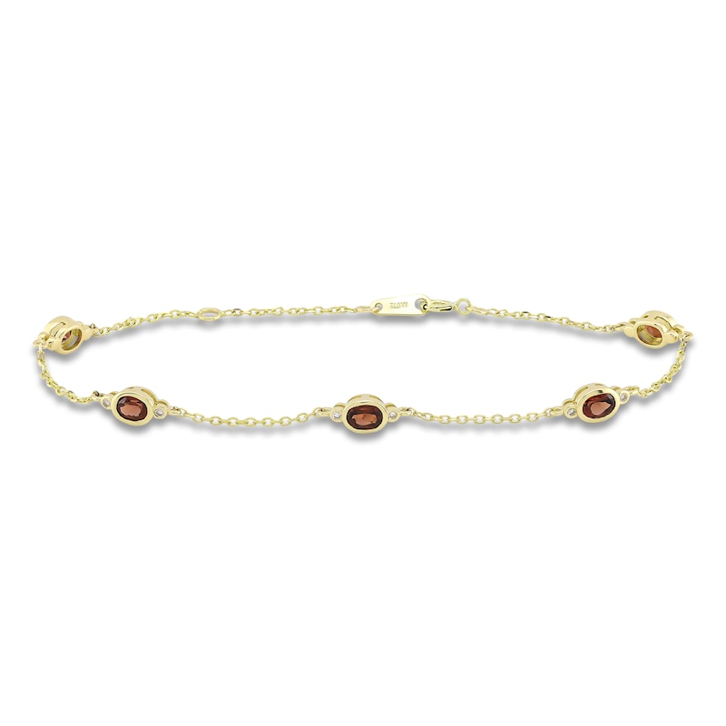 Main Image 1 of Oval-Cut Natural Garnet & Diamond Bezel-Set Bracelet 1/20 ct tw 10K Yellow Gold 7.25"