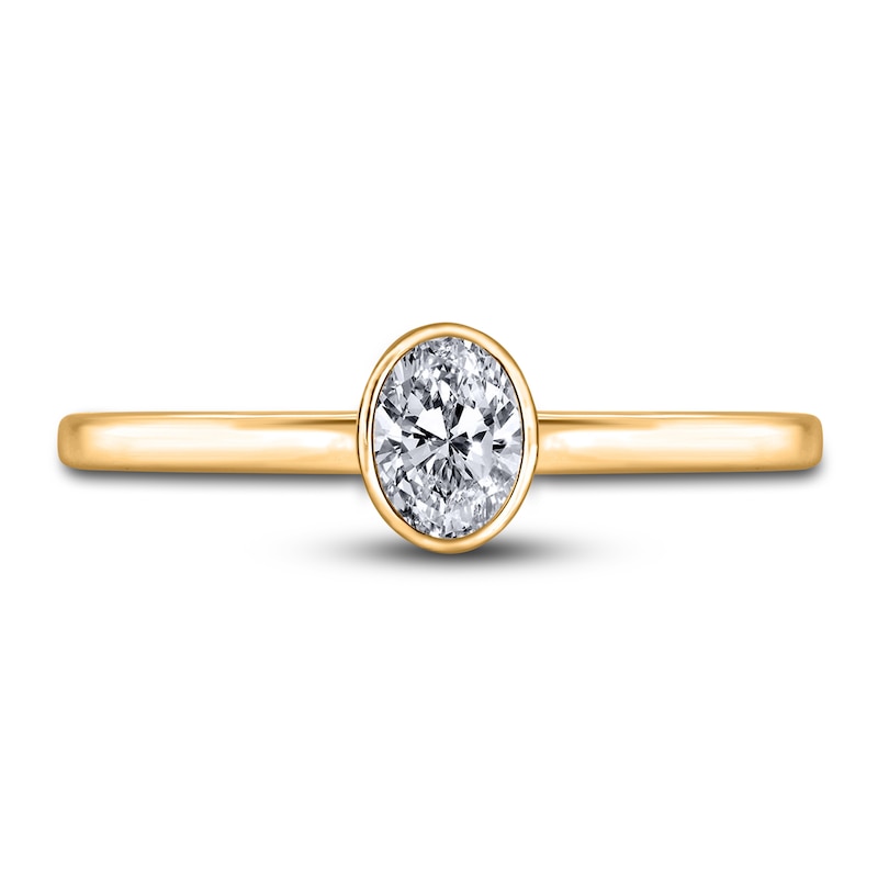 Main Image 3 of Diamond Solitaire Engagement Ring 1/2 ct tw Bezel-Set Oval 14K Yellow Gold (I2/I)